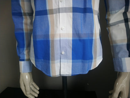 We fashion shirt. Blue black brown white checkered. Size M.