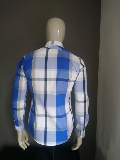 We fashion shirt. Blue black brown white checkered. Size M.