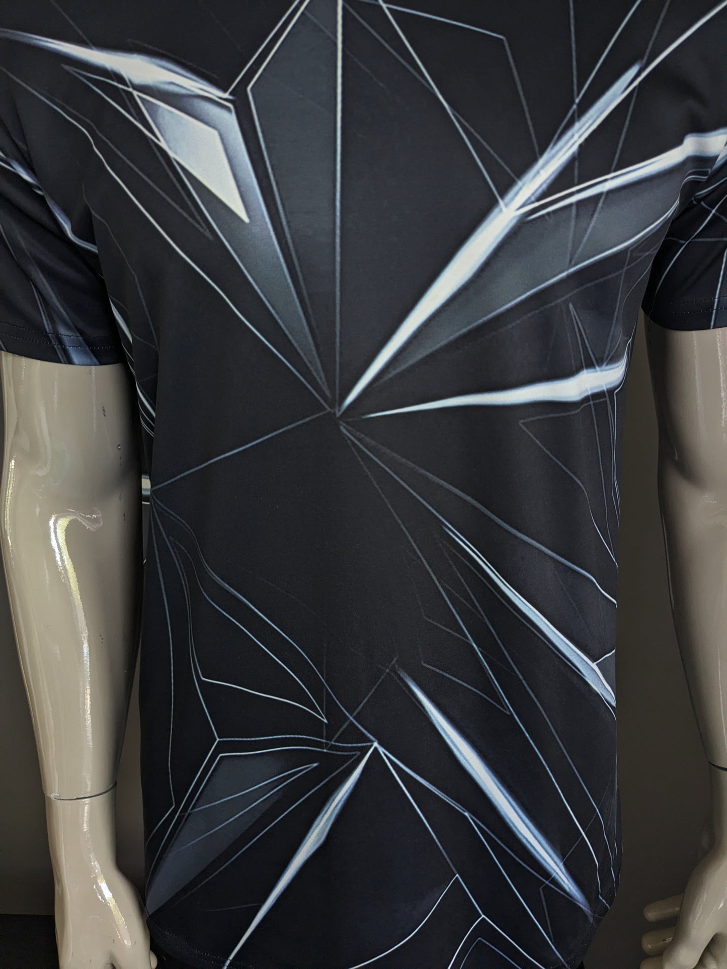 Geometric Print shirt. Black white colored. Size M. Stretch.