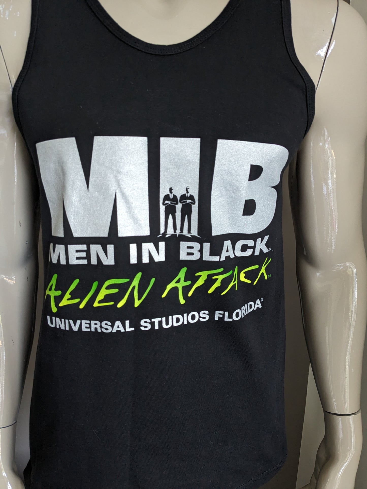 MIB VINTAGE original en Black / Universal Studios Singlete. Negro con impresión. Talla M.