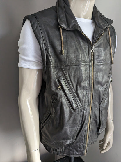 Vintage Prince leren bodywarmer. Zwart gekleurd. Maat 52 / L. met 2 binnenzakken.