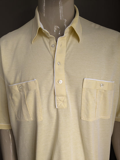 Polo Monte Carlo vintage avec bande élastique. Couleur jaune clair. Taille 4xxl / xxxxl.