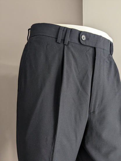 Woolen trousers with cover. Dark blue colored. Size 52 / L. #500.