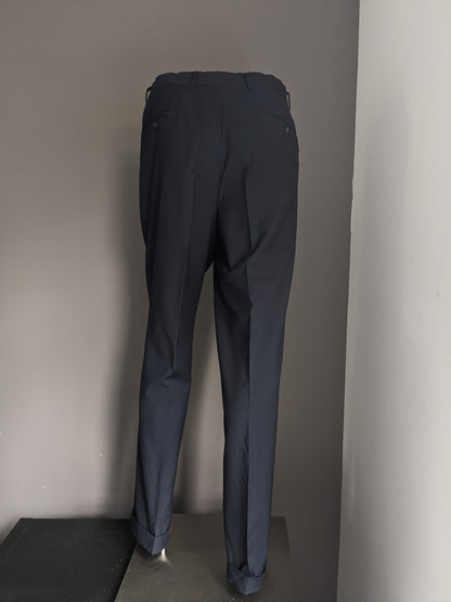 Woolen trousers with cover. Dark blue colored. Size 52 / L. #500.