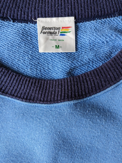 Uniek Vintage Benneton Formula Racing 1 trui. Blauw met opdruk. Maat M /L.