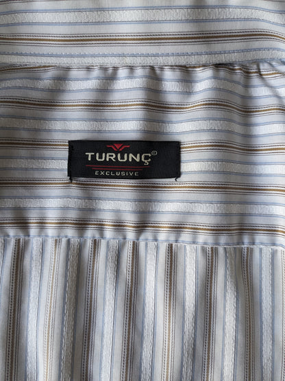 Chemise Turunç avec double col. Brun bleu blanc rayé. Taille xl / xxl.