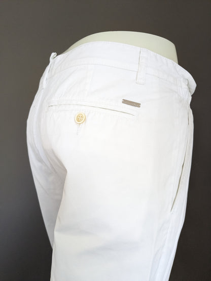 Dsquared2 trousers with elastic waistband. Colored white. Size 48 / M.