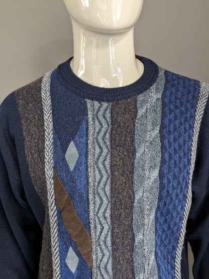 Pull vintage. Couleur gris brun bleu foncé. Taille xl.