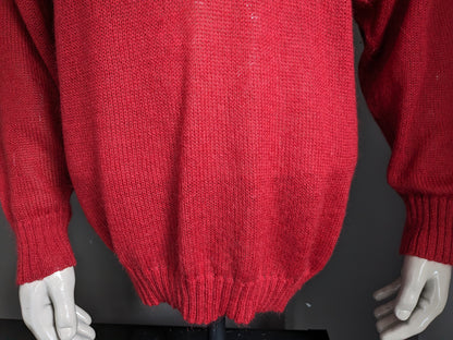 Pull en laine März Mohair vintage. Colore rouge avec le devant d'application. Taille xl.