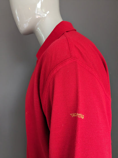 Vintage N.L.F. Maglione polo di lana con bottoni. Rosso colorato. Dimensione 2xl / xxl. 50% lana.