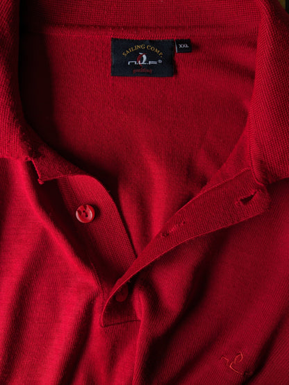 Vintage N.L.F. Wollen polotrui met knopen. Rood gekleurd. Maat 2XL / XXL. 50% Wol.