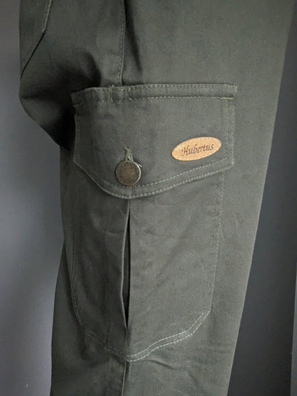 Hubertus Hunting Broek with a pocket side. Dark green colored. Size 29 (58 / XL-2XL)