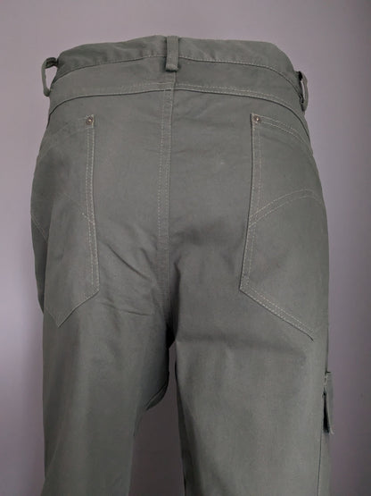 Hubertus Hunting Broek with a pocket side. Dark green colored. Size 29 (58 / XL-2XL)