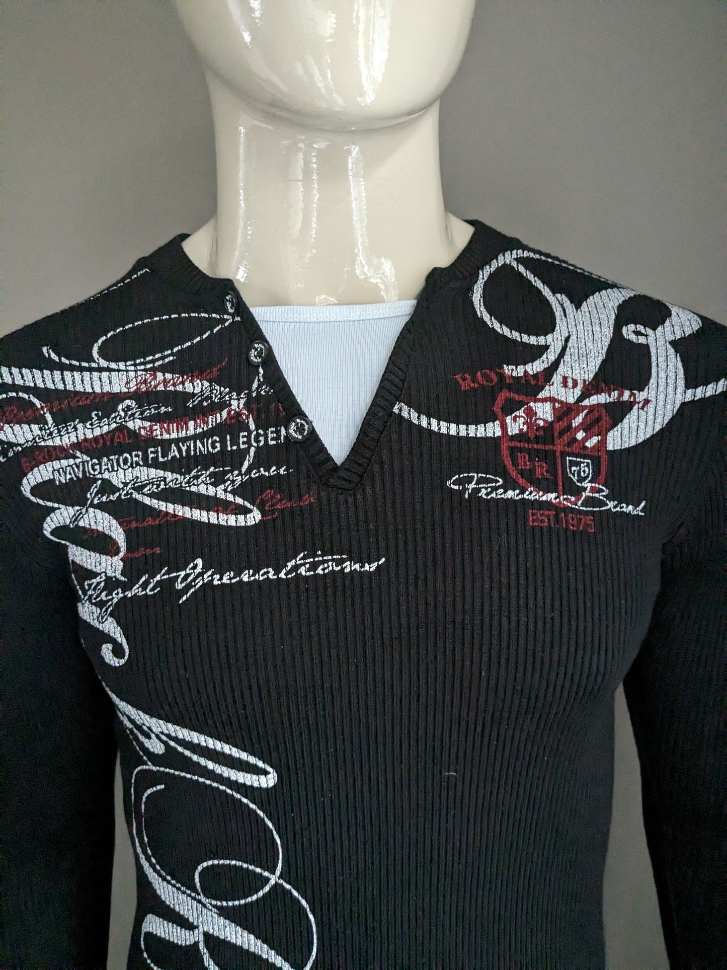 Black rock sweater with buttons. Black white colored. Size XL / L. Stretch.