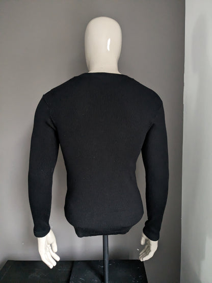 Pull de rock noir avec boutons. Couleur blanc noir. Taille XL / L. Stretch.