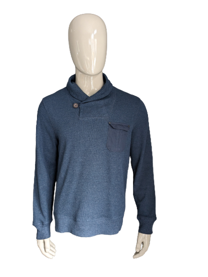 Pull Burton avec col sportif. Bleu foncé mélangé. Taille L.