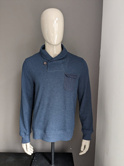 Pull Burton avec col sportif. Bleu foncé mélangé. Taille L.