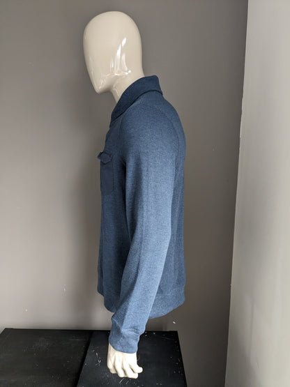 Pull Burton avec col sportif. Bleu foncé mélangé. Taille L.