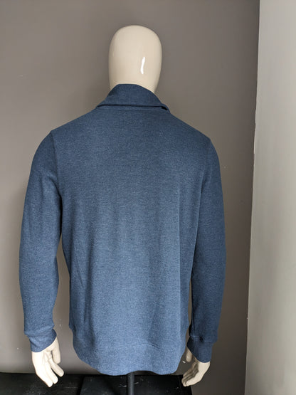 Pull Burton avec col sportif. Bleu foncé mélangé. Taille L.