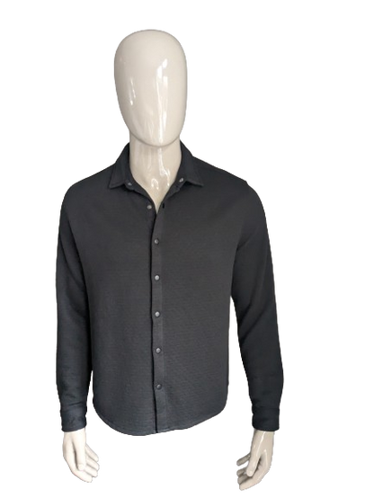 TU premium man shirt with press studs. Dark gray tangible motif. Size M.