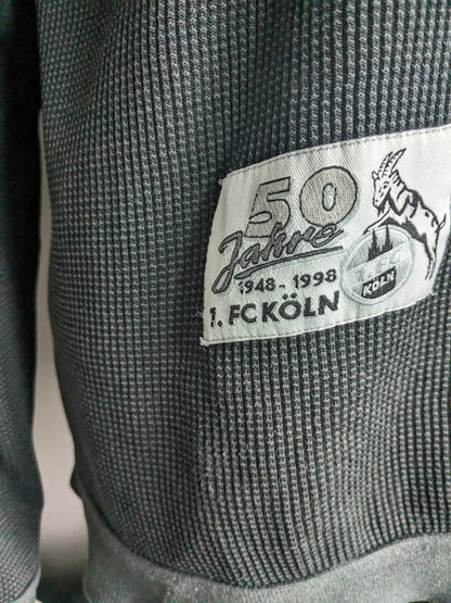 Unique jubilee FC Köln sweater with zipper. "50 years FC Köln". Dark gray colored. Size XL.