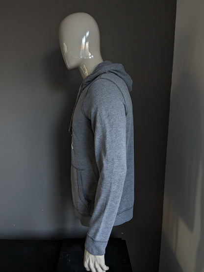 Hollister Hoodie. Donker Grijs gemêleerd met opdruk. Maat M.