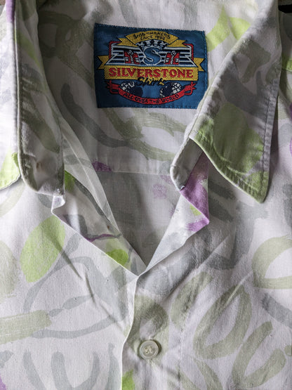 Vintage 90's silverstone shirt short sleeve. Purple green white print. Size L.