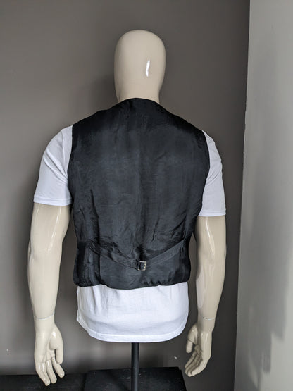 Gilet with upholstered buttons. Black colored. Size M. #337.