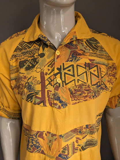 Vintage polo with elastic band. Dark yellow with print. Size L.