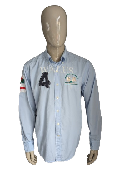 La Martina shirt. Light blue with applications. Size XL.