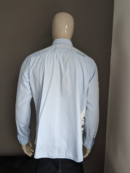 La Martina shirt. Light blue with applications. Size XL.