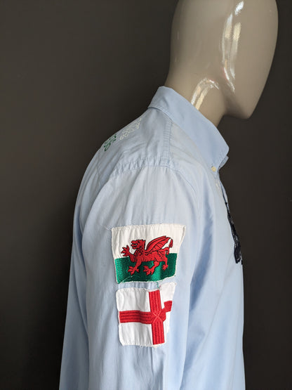 La Martina shirt. Light blue with applications. Size XL.