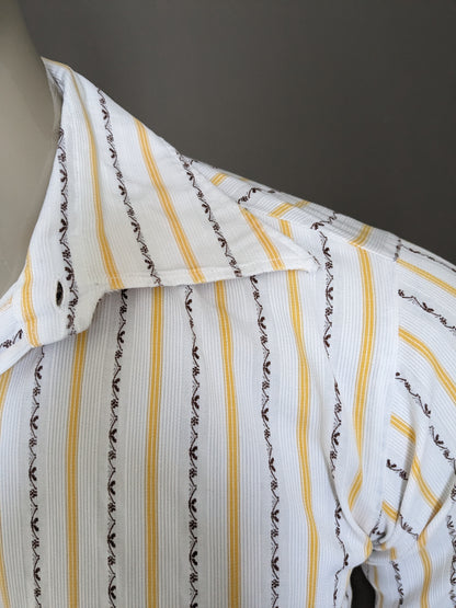 Camisa de los 70 vintage con cuello puntual. Amarillo marrón blanco rayado. Talla L.