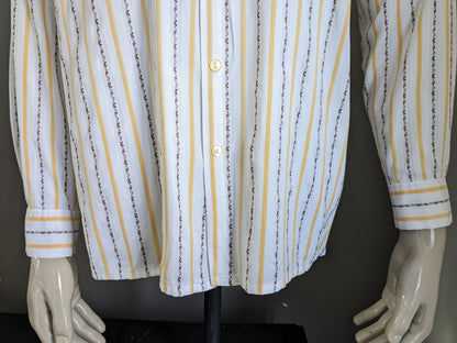 Camisa de los 70 vintage con cuello puntual. Amarillo marrón blanco rayado. Talla L.