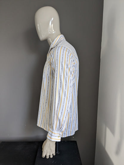 Camisa de los 70 vintage con cuello puntual. Amarillo marrón blanco rayado. Talla L.