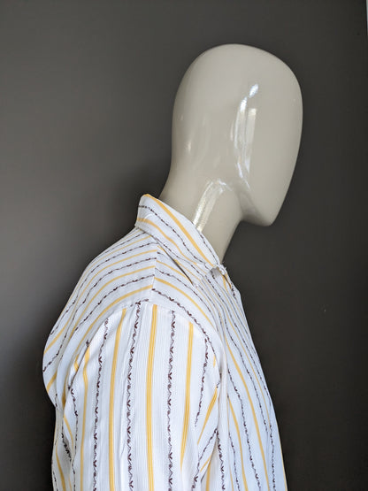 Camisa de los 70 vintage con cuello puntual. Amarillo marrón blanco rayado. Talla L.