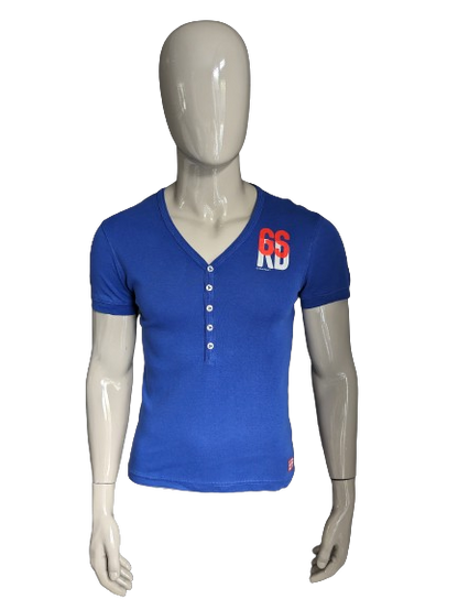 Camisa cruda G-Star con botones. Color azul con impresión. Talla M.