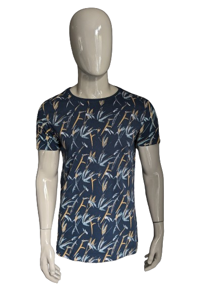 Madness shirt. Dark blue gray brown green print. Size L.