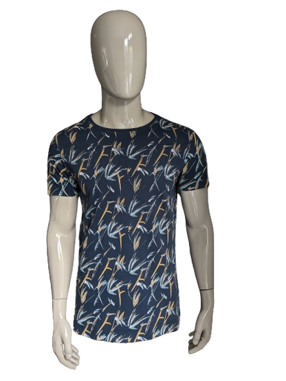 Madness shirt. Dark blue gray brown green print. Size L.