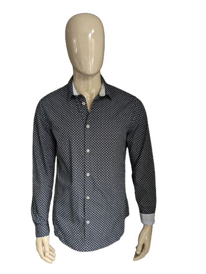 Chemise H&M. Bleu avec des points blancs. Taille L. Slim Fit.