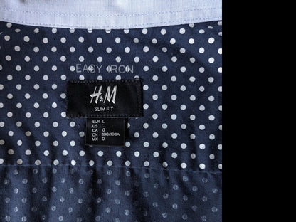 H&M shirt. Blue with white dots. Size L. Slim Fit.