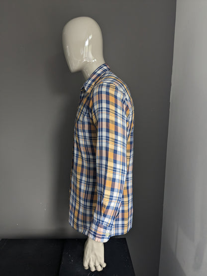 Camicia vintage degli anni '70 con colletto punto. Scazzo a scacchi bianchi blu giallo. Taglia L.