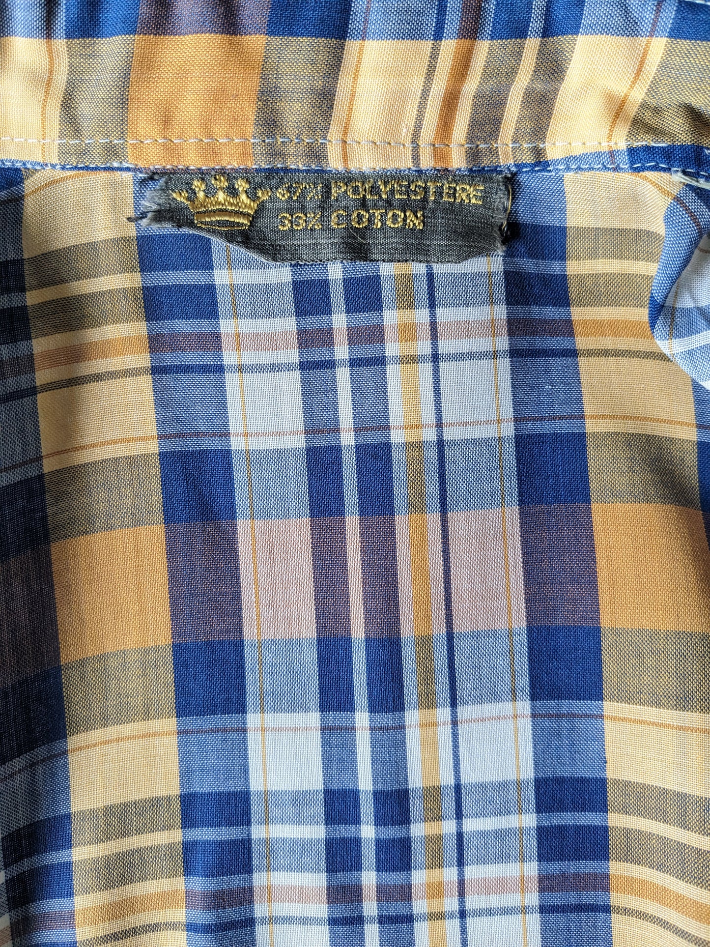 Camicia vintage degli anni '70 con colletto punto. Scazzo a scacchi bianchi blu giallo. Taglia L.