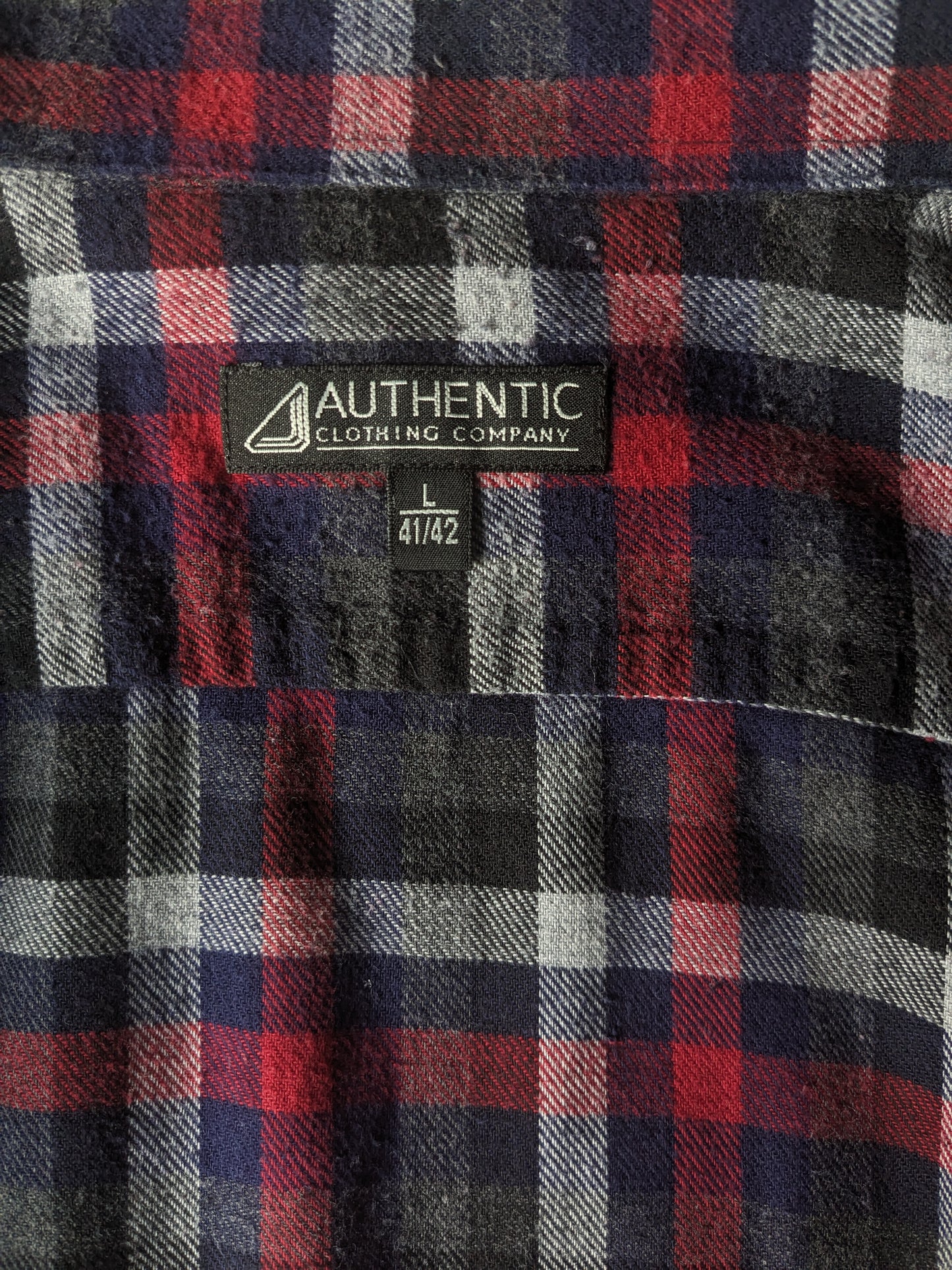 Authentic flannel shirt. Red black gray blue blocked. Size L / XL.