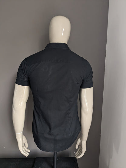 Casual shirt short sleeve. Black colored. Size M.