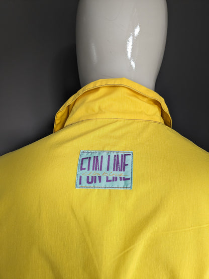 Pull Sport Funline Vintage avec goujons de presse. Couleur violette vert jaune. Taille xl.