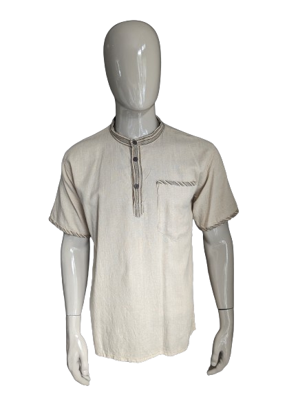 Camisa de Tanawa con botones y mao / agricultores / cuello elevado. Color beige. Talla M.