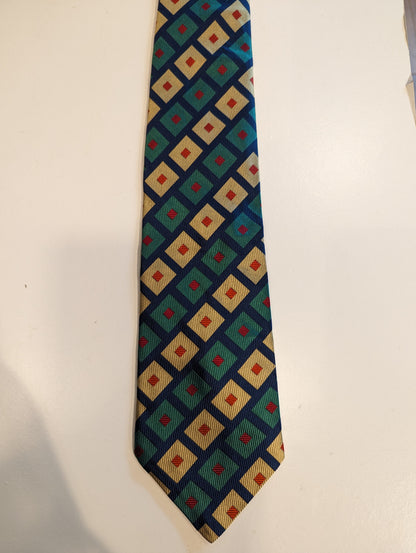 Vintage silk aquascutum designer tie. Green blue red motif.