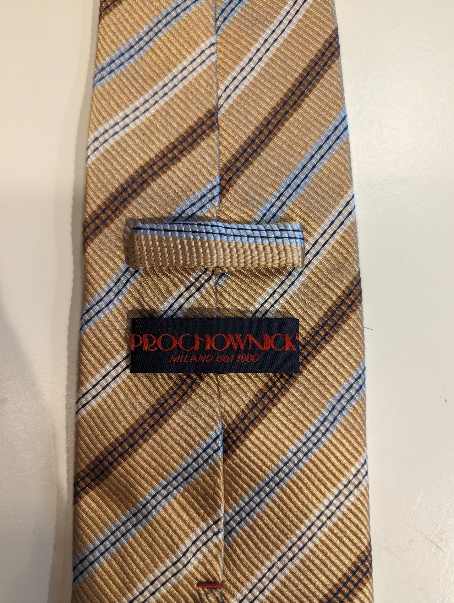 Prochownick silk designer tie. Gold brown light blue.