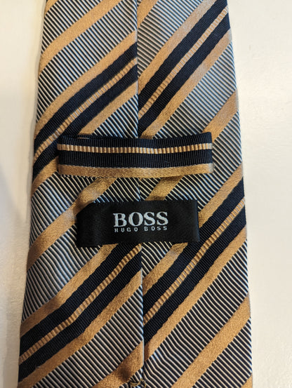 Hugo Boss silk tie. Black gold gray.